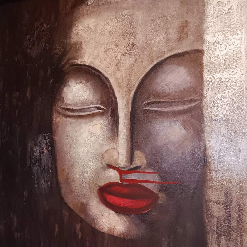 A face with closed eyes and red lips painted in bronze and charcoal tones
