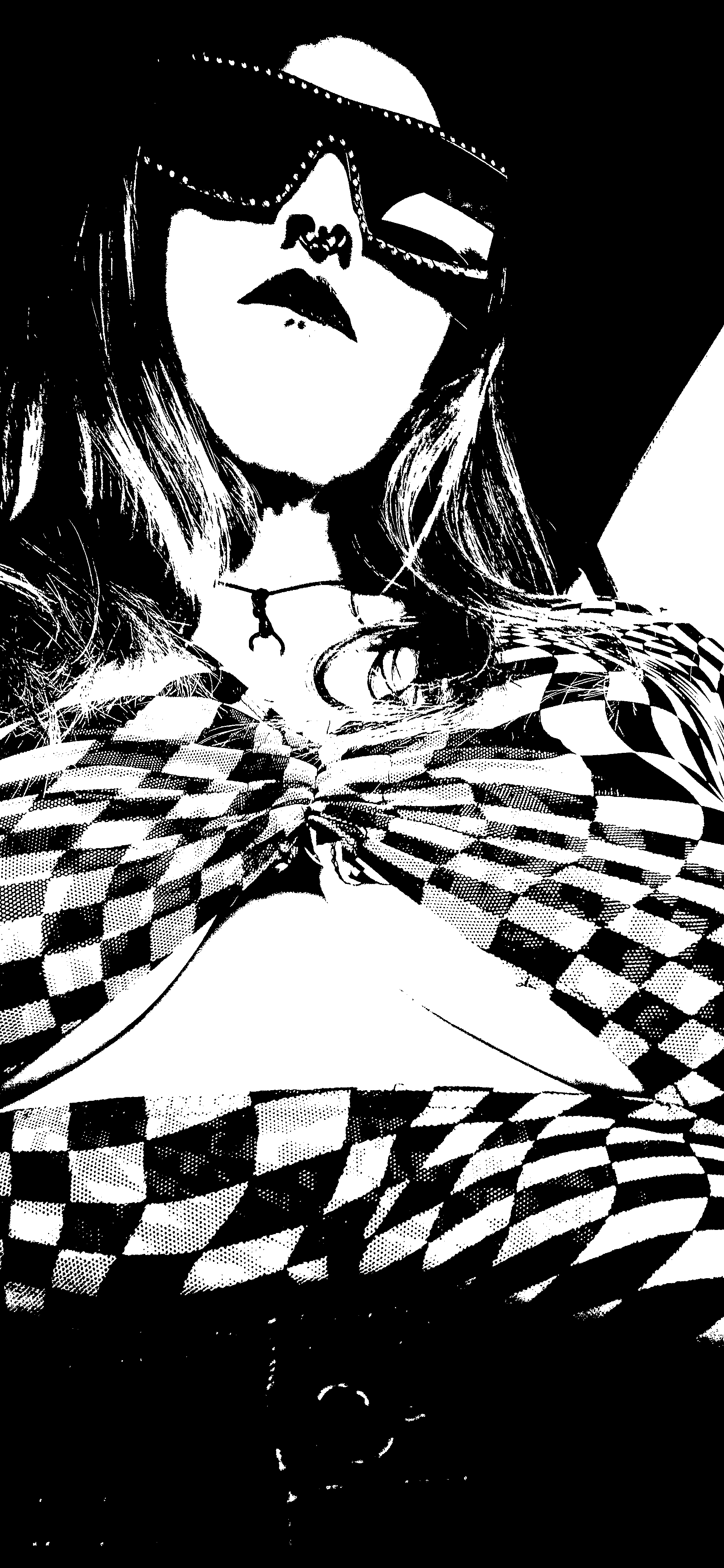 Upward-looking portrait in sunglasses and a checkered top