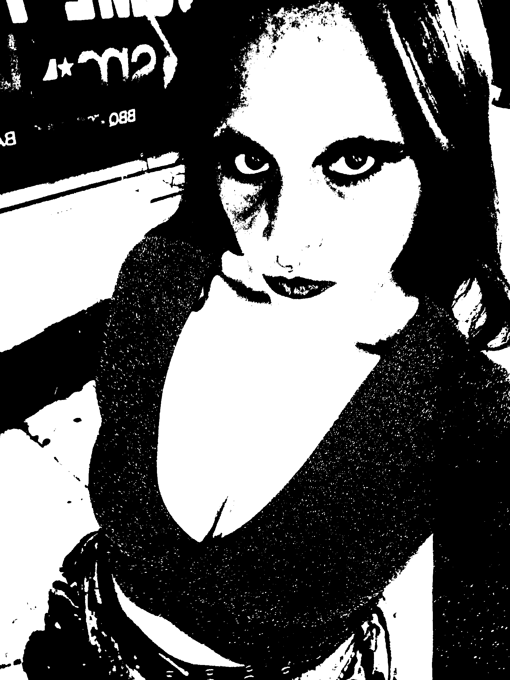 Downward-looking close portrait with an upward gaze