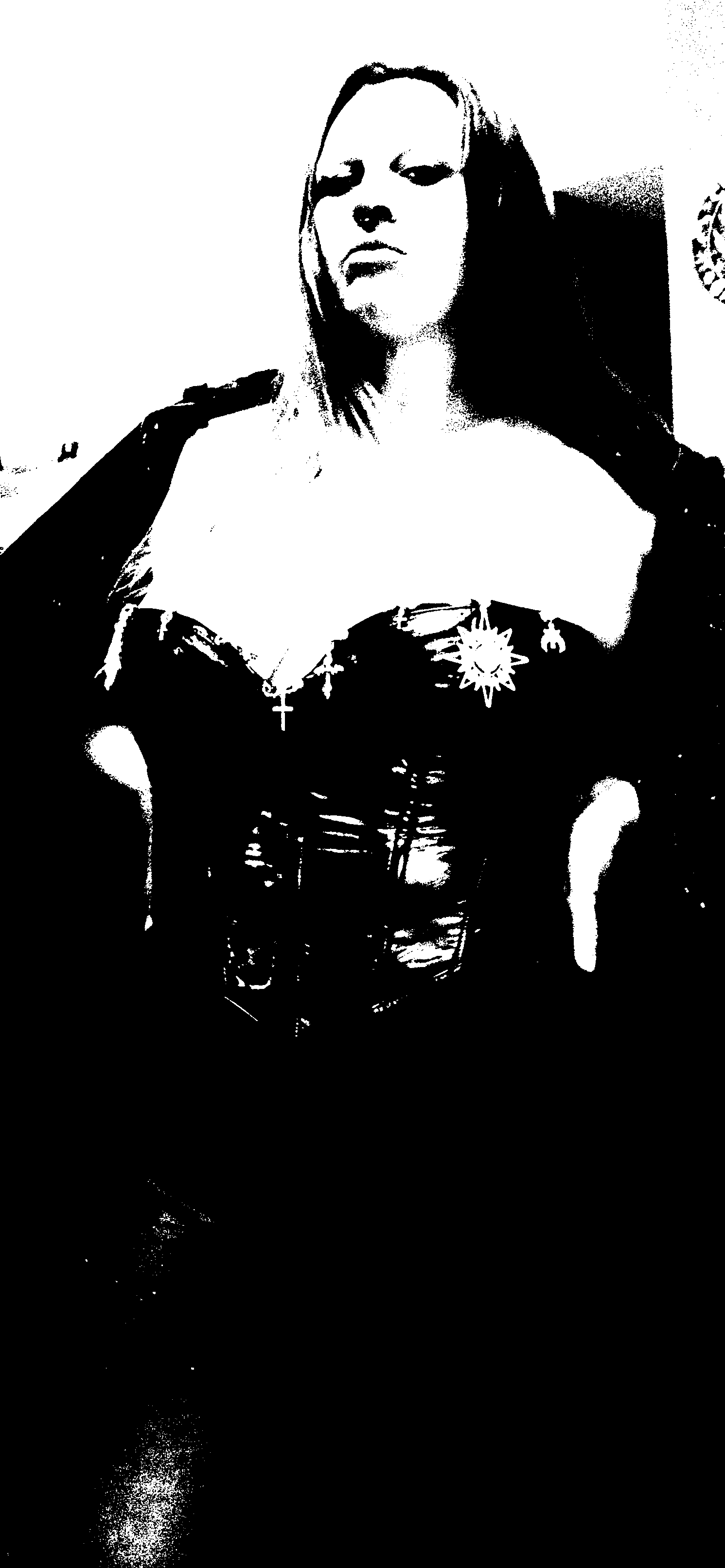 Standing threshold portrait in a dark corset