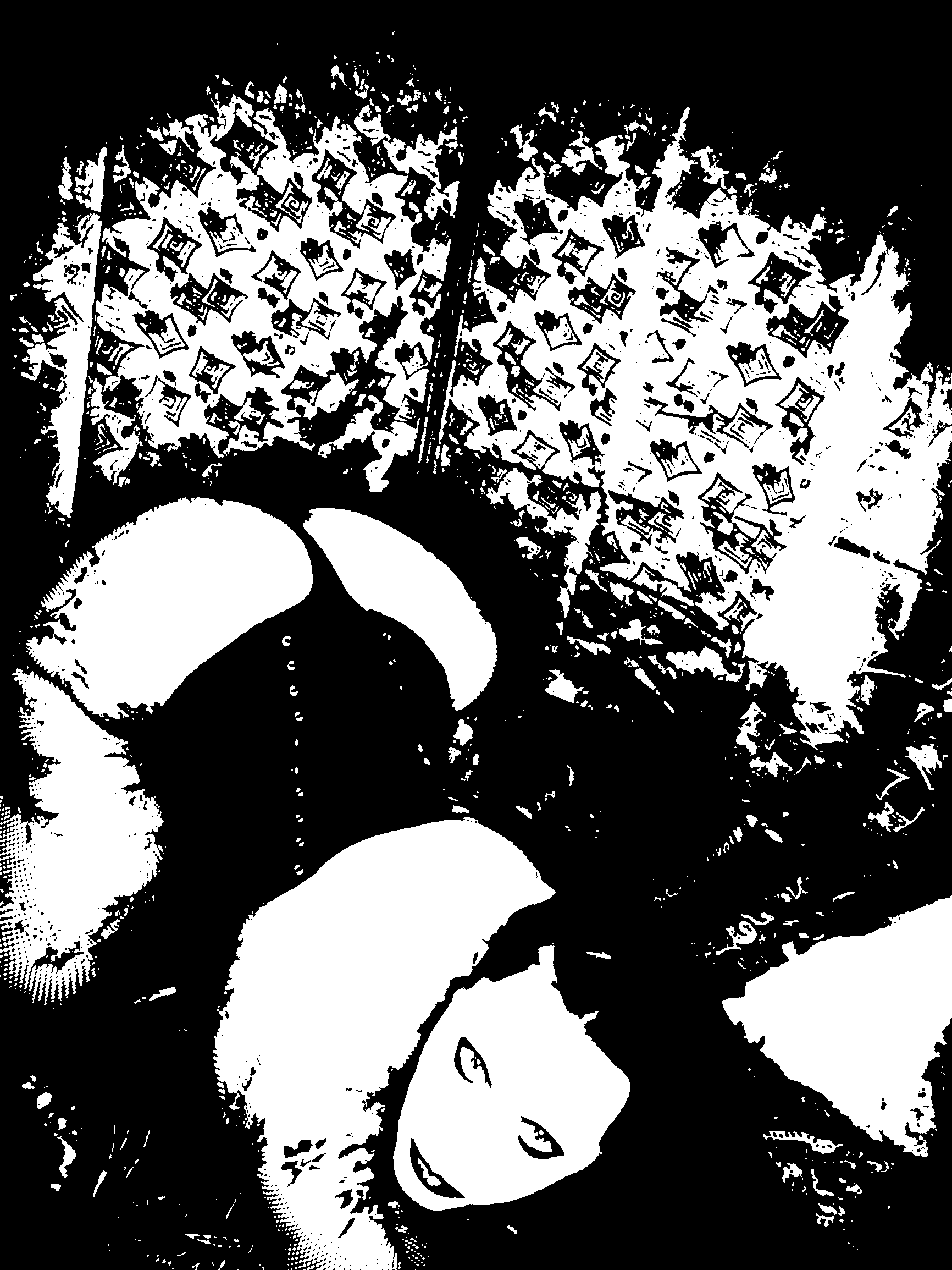 Reclining figure beneath a patterned background, viewed upside down